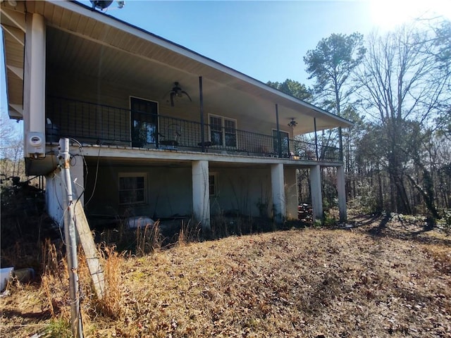 view of property exterior with a balcony