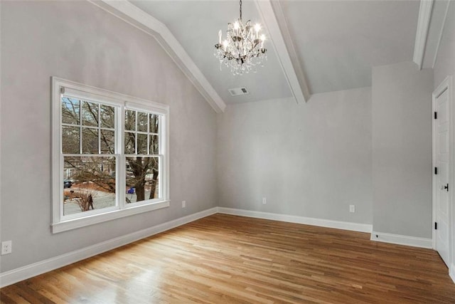 interior space featuring an inviting chandelier, hardwood / wood-style floors, and vaulted ceiling with beams