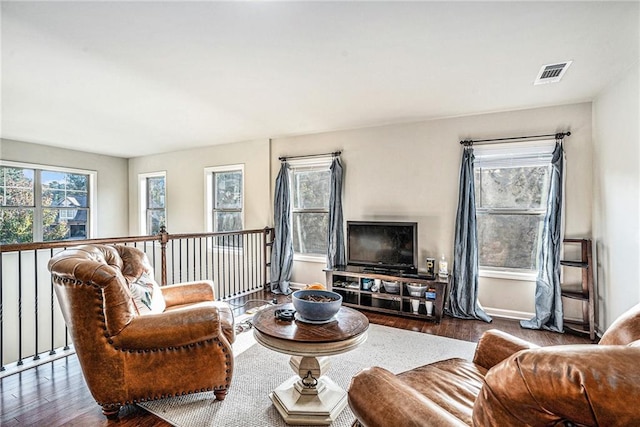 living room with dark hardwood / wood-style floors