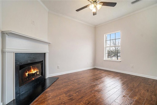 unfurnished living room featuring crown molding, ceiling fan, and dark hardwood / wood-style flooring