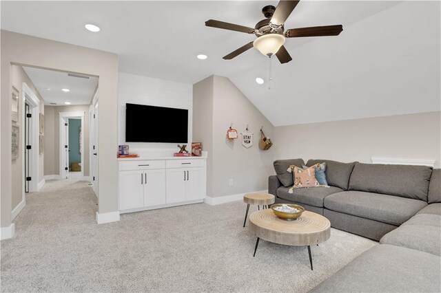 laundry area with cabinets, independent washer and dryer, and light hardwood / wood-style floors