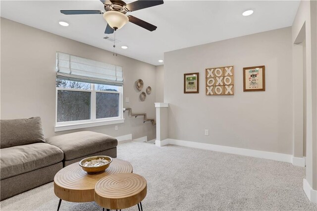 mudroom with sink and light hardwood / wood-style floors