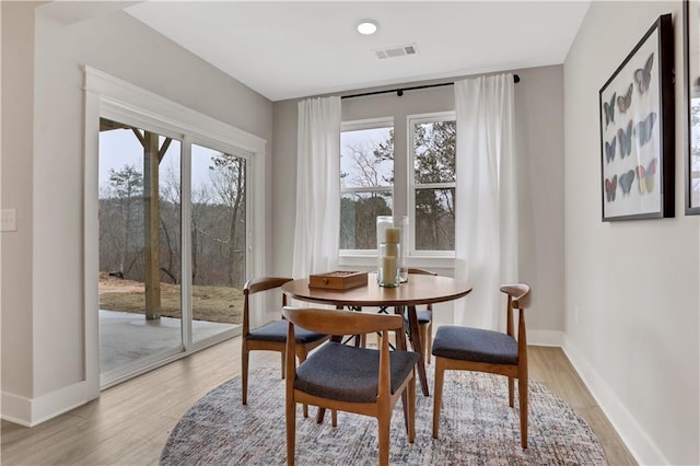 dining area featuring light hardwood / wood-style flooring