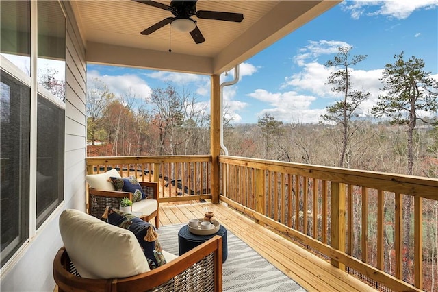 wooden terrace with ceiling fan