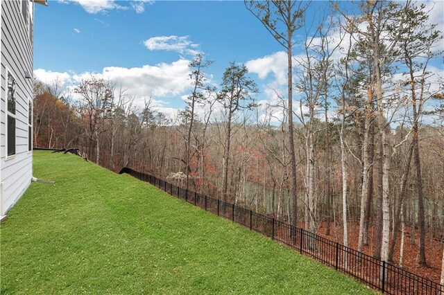 view of yard featuring a deck and a patio area