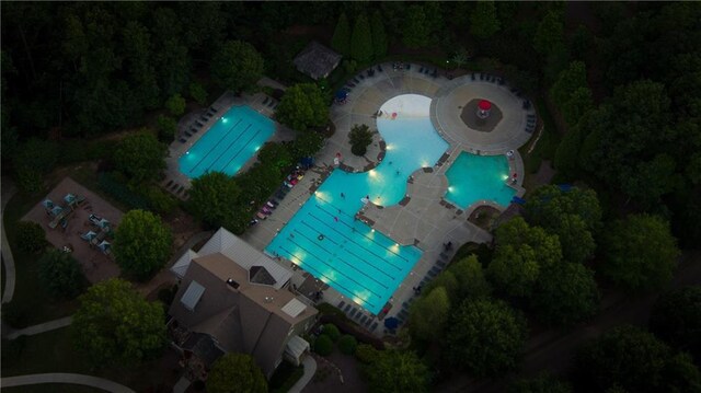 view of pool with a water slide