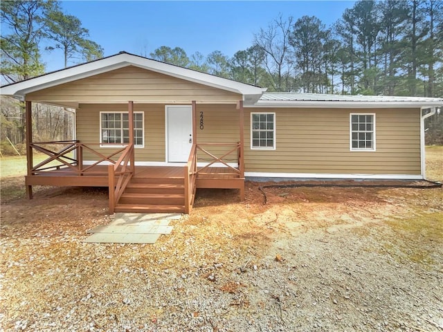 view of front of property featuring covered porch