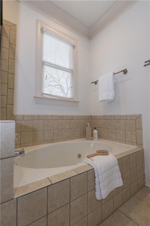 full bath featuring a jetted tub, ornamental molding, and tile patterned flooring