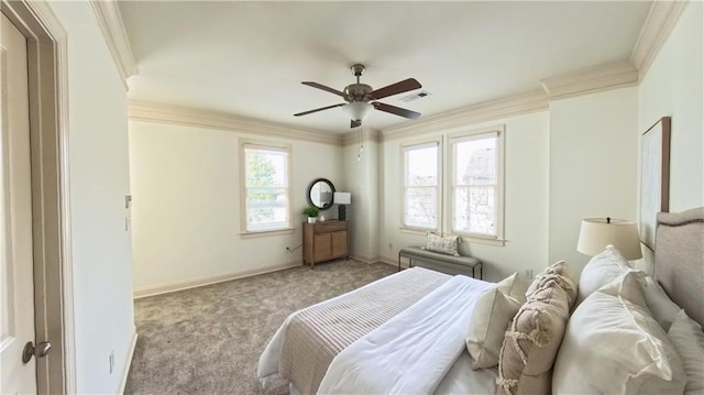 carpeted bedroom featuring visible vents, baseboards, ornamental molding, and a ceiling fan