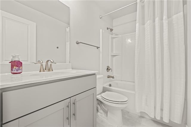 full bathroom featuring shower / bath combination with curtain, vanity, and toilet