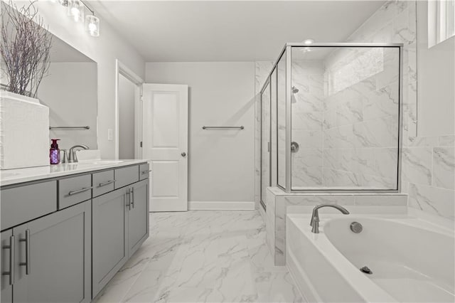 bathroom featuring vanity and separate shower and tub