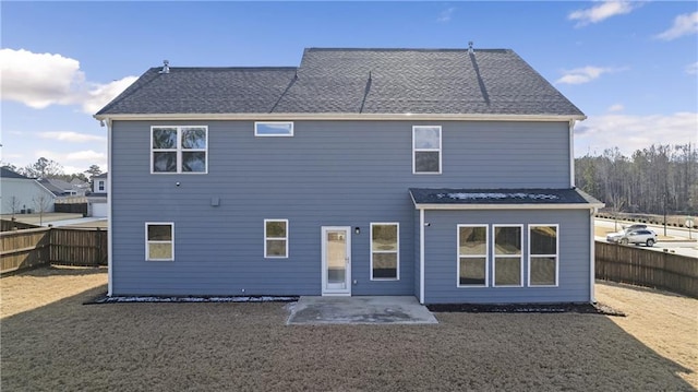 rear view of property with a patio