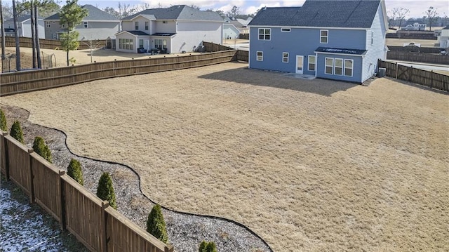 rear view of property featuring central air condition unit and a patio area