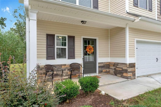 property entrance featuring a garage