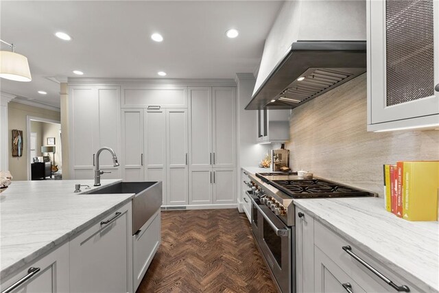 1539 Berkeley Ct, Gainesville, GA 30501 - kitchen featuring stainless steel range, wall chimney exhaust hood, recessed lighting, pendant lighting, and crown molding