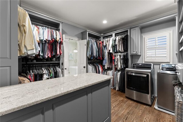 1539 Berkeley Ct, Gainesville, GA 30501 - spacious closet featuring washer and clothes dryer and wood finished floors