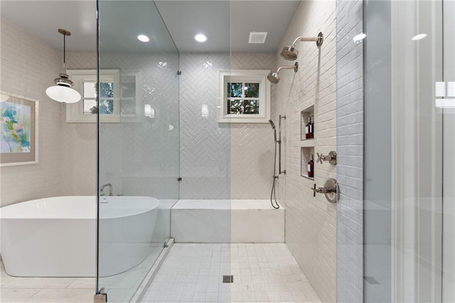 1539 Berkeley Ct, Gainesville, GA 30501 - bathroom with a tile shower, a freestanding bath, and tile patterned flooring