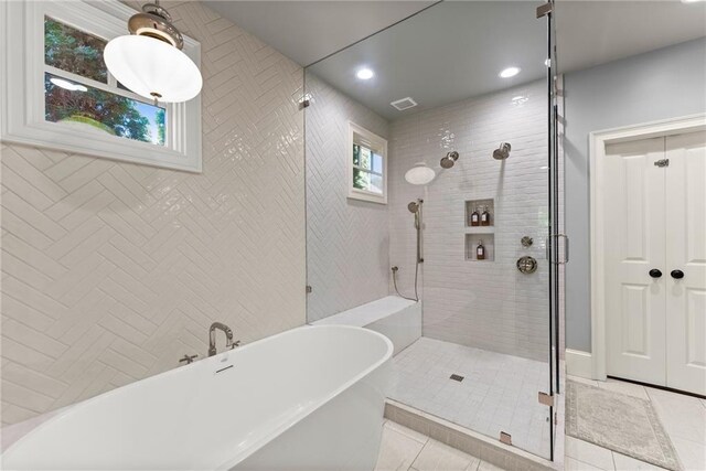 1539 Berkeley Ct, Gainesville, GA 30501 - bathroom with a shower stall, a freestanding tub, tile patterned flooring, and recessed lighting