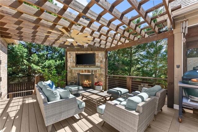 1539 Berkeley Ct, Gainesville, GA 30501 - wooden deck with an outdoor living space with a fireplace
