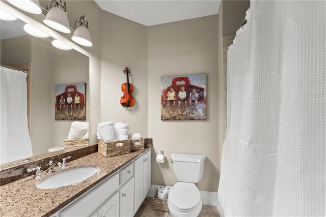 1539 Berkeley Ct, Gainesville, GA 30501 - full bathroom featuring vanity, toilet, tile patterned floors, baseboards, and curtained shower