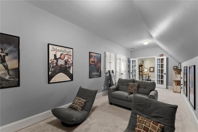 1539 Berkeley Ct, Gainesville, GA 30501 - living room featuring french doors, light colored carpet, lofted ceiling, and baseboards