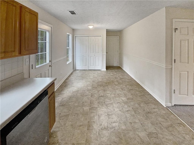 interior space featuring a textured ceiling