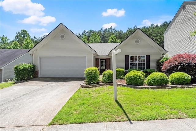 2125 Mina Lane Dr, Buford, GA 30518 - ranch-style home featuring a garage, concrete driveway, a front yard, and brick siding