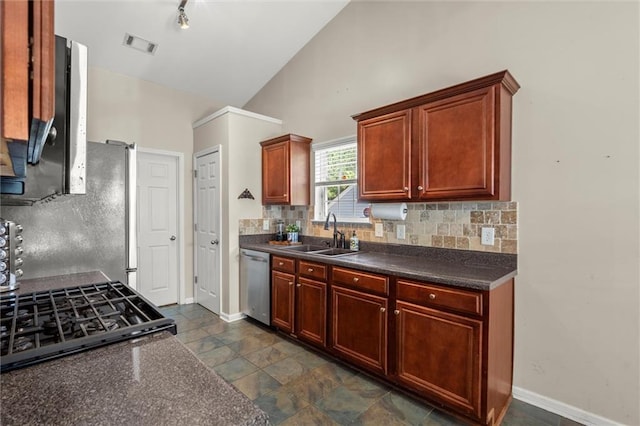 2125 Mina Lane Dr, Buford, GA 30518 - kitchen featuring a sink, stainless steel appliances, dark countertops, backsplash, and baseboards