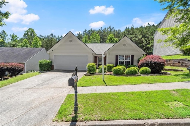 2125 Mina Lane Dr, Buford, GA 30518 - view of front facade featuring an attached garage, concrete driveway, and a front yard