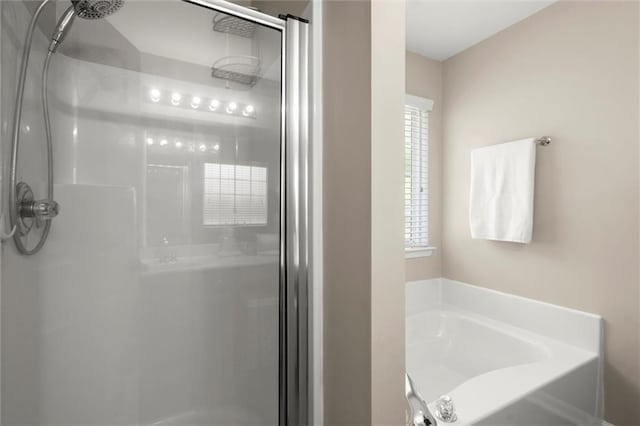 2125 Mina Lane Dr, Buford, GA 30518 - full bathroom featuring a shower stall and a garden tub