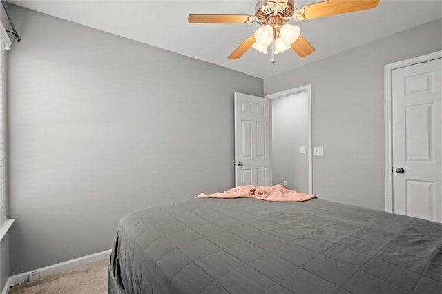 2125 Mina Lane Dr, Buford, GA 30518 - bedroom with carpet flooring, baseboards, and a ceiling fan