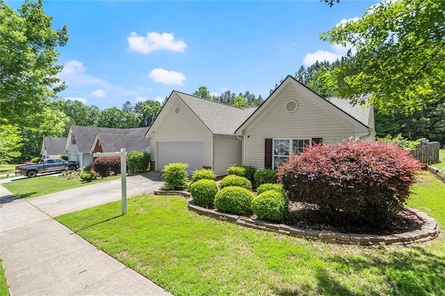 2125 Mina Lane Dr, Buford, GA 30518 - view of front facade featuring a front yard, an attached garage, driveway, and roof with shingles