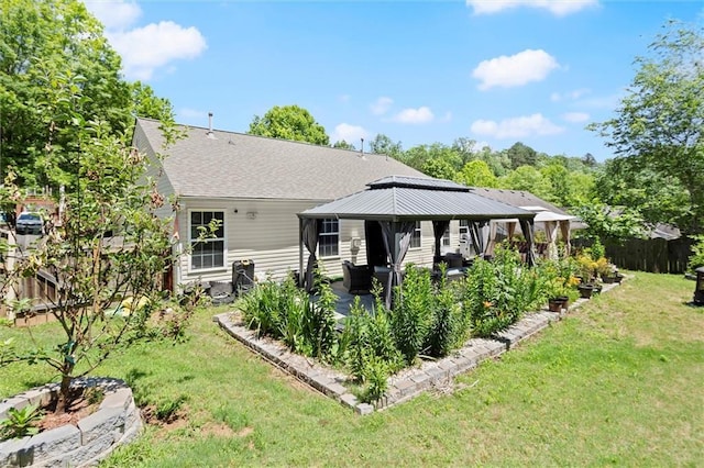2125 Mina Lane Dr, Buford, GA 30518 - rear view of house featuring a gazebo, a patio, and a shingled roof