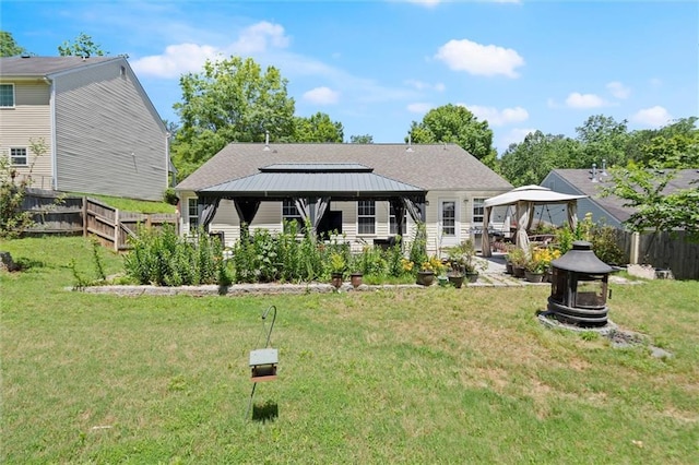 2125 Mina Lane Dr, Buford, GA 30518 - rear view of property with a gazebo and an outdoor fire pit