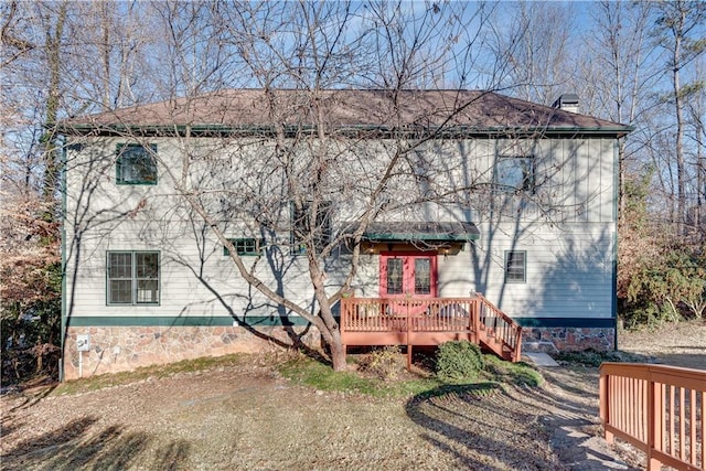 rear view of house with a deck