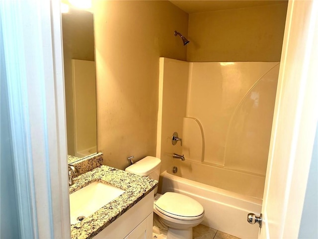 bathroom with shower / bathing tub combination, tile patterned flooring, vanity, and toilet