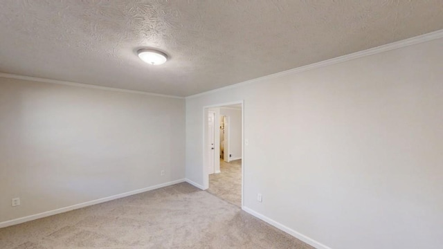 3359 Mansfield Ln, Snellville, GA 30039 - spare room with baseboards, light colored carpet, ornamental molding, and a textured ceiling