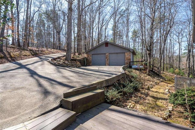 193 Alm Ln, Ellijay, GA 30540 - wooden deck featuring an outdoor structure and a garage