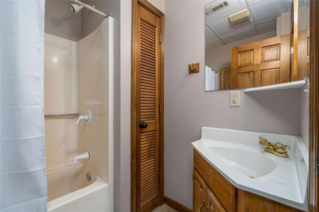 193 Alm Ln, Ellijay, GA 30540 - bathroom featuring vanity, shower / bath combo with shower curtain, and a closet