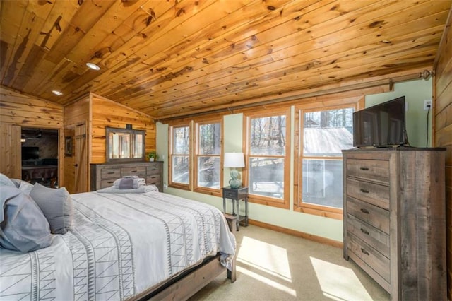 193 Alm Ln, Ellijay, GA 30540 - carpeted bedroom featuring lofted ceiling, wood ceiling, wood walls, and baseboards