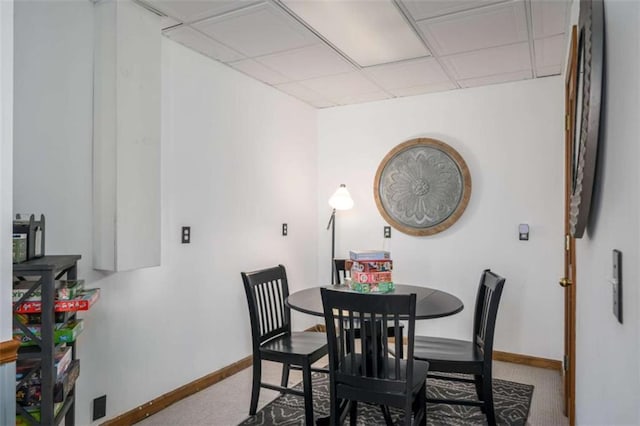 193 Alm Ln, Ellijay, GA 30540 - dining room with baseboards, carpet flooring, and a paneled ceiling