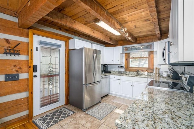 193 Alm Ln, Ellijay, GA 30540 - kitchen featuring appliances with stainless steel finishes, wooden ceiling with exposed beams, a sink, white cabinets, and light tile patterned floors