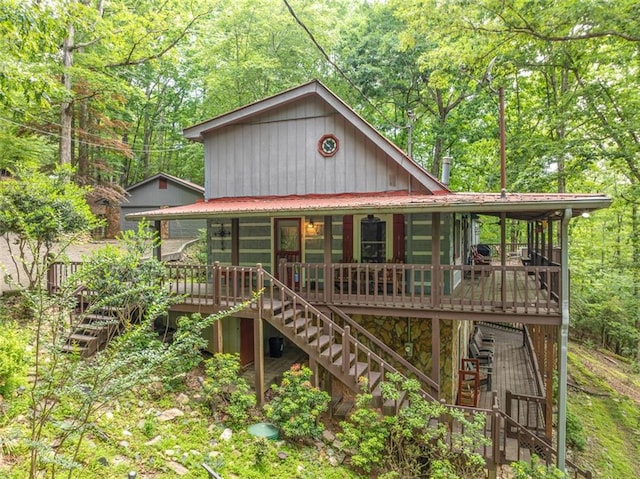 193 Alm Ln, Ellijay, GA 30540 - view of front of house featuring stairs, metal roof, and a view of trees