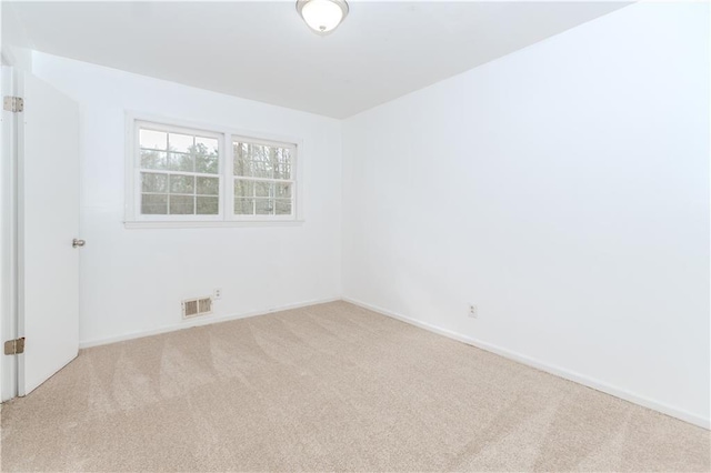 empty room with carpet floors