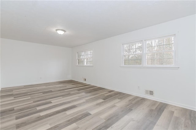 empty room featuring light hardwood / wood-style flooring