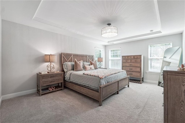 2860 Windsor Knoll Dr, Dacula, GA 30019 - bedroom featuring a raised ceiling, carpet floors, and multiple windows