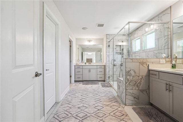 2860 Windsor Knoll Dr, Dacula, GA 30019 - bathroom featuring a marble finish shower and two vanities