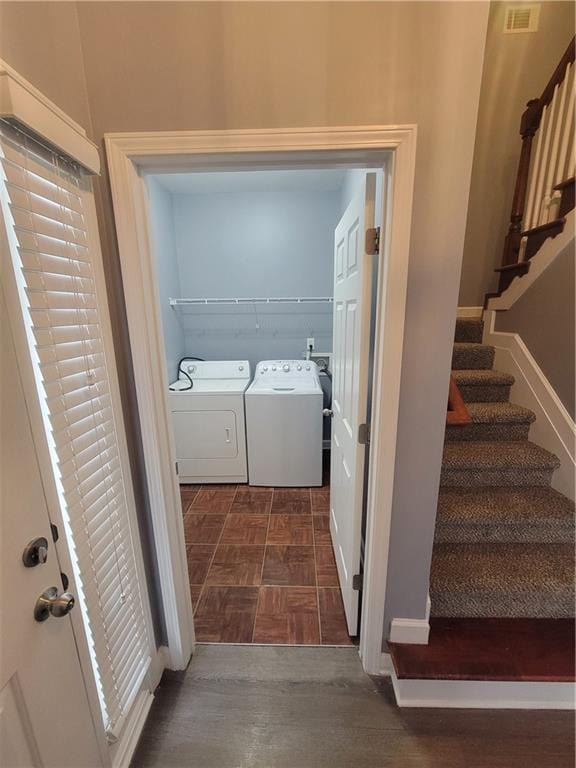 laundry room with washer and dryer