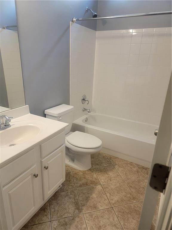 full bathroom with vanity, toilet, tub / shower combination, and tile patterned flooring