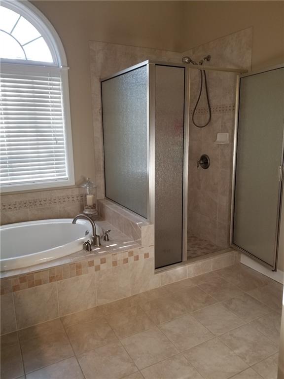 bathroom with vanity and an enclosed shower